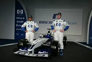 Images Dated 31st January 2003: BMW Williams F1 Launch: L-R; Juan Pablo Montoya and Ralf Schumacher pose with the new BMW Williams