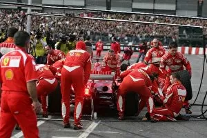 Images Dated 8th December 2006: Bologna Motor Show: Marc Gene and the Ferrari team demonstrate a pit stop