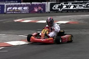 Images Dated 9th December 2002: Bologna Motorshow: 125cc Motorbike Racer and keen karter Simone Sanna competed in the celebrity