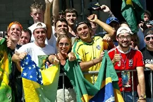 Images Dated 27th May 2002: The Brazilian fans celebrate Helio Castroneves: Indianapolis 500, Indianapolis, USA, 26 May 2002