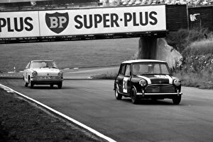 1962 Collection: British Saloon Car Racing: A Mini leads a BMW