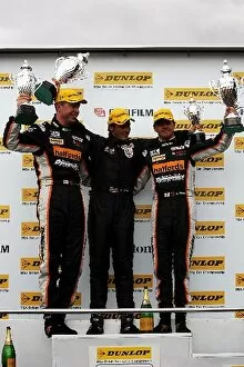 Images Dated 7th August 2005: British Touring Car Championship: Podium L to R: Matt Neal Team Halfords second, Tom Chilton first