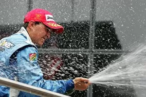 Images Dated 27th August 2007: Champ Car World Series: Second placed Graham Rahal Newman Hs Lanigan Racing celebrates