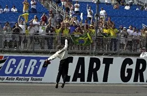 Images Dated 1st July 2002: Cristiano da Matta celebrates with Brazilian fans after winning the CART Grand Prix of Chicago