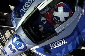 Images Dated 2nd June 2002: Dario Franchitti waits in qualifying line before going ninth fastest for the Miller Lite 250