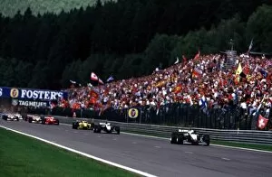 David Coulthard leads at the start Alian Prost with Nick Heidfeld