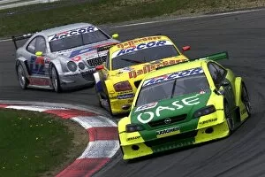 Images Dated 8th May 2001: Deutche Tourenwagen Masters: Michael Bartels Opel Astra Coupe leads Laurent Aiello