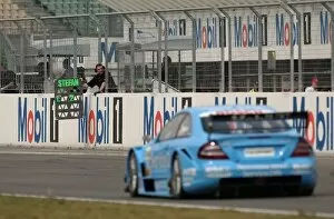 Images Dated 26th April 2003: DTM Championship: Team member holding up the pitboard for Stefan Muecke, Service 24h AMG-Mercedes
