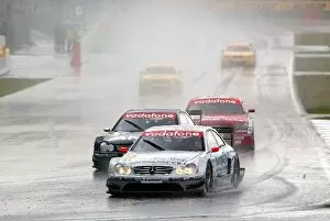 DTM: Christijan Albers, Service 24h AMG-Mercedes-Benz CLK DTM, leads cars in the very wet conditions