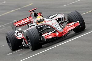 United Kingdom Collection: DTM: Lewis Hamilton demonstrates a McLaren Mercedes F1 car for the crowd