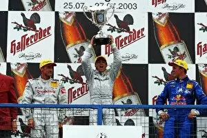 Images Dated 27th July 2003: DTM: The podium L to R, Bernd Schneider Vodafone AMG-Mercedes, Jean Alesi AMG-Mercedes