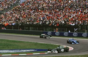 Images Dated 19th May 2000: F1 Spanish GP-Eddie Irvine leads Wurz followed by Herbert