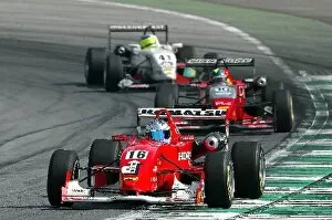 Images Dated 8th September 2003: F3 Euro Series: Robert Doornbos Team Ghinzani Dallara Mugen Honda leads Fabio Carbone Signature