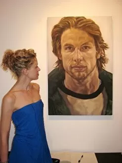 Exhibition Gallery: The Face of F1 by Jill Bradley: Jill Bradley, artist, with a portrait of Jenson Button