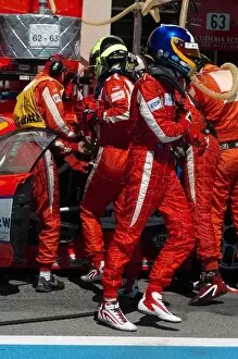 Images Dated 22nd August 2006: FIA GT Championship: Nathan Kinch Scuderia Ecosse vacates the area as co-driver Andrew Kirkaldy