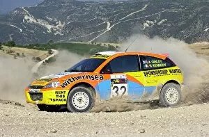 Images Dated 26th June 2003: FIA World Rally Championship: Alistair Ginley Ford Focus RS WRC01 with co-driver Rory Kennedy