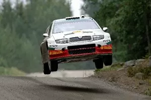 Finland Collection: FIA World Rally Championship: Armin Schwarz, Skoda Fabia WRC, on stage 4