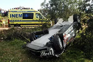 Images Dated 23rd March 2011: FIA World Rally Championship: The Ford Fiesta RS WRC of Ken Block after a big crash