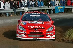 Images Dated 29th October 2004: FIA World Rally Championship: Freddy Loix, Peugeot 307 WRC, on the shakedown stage