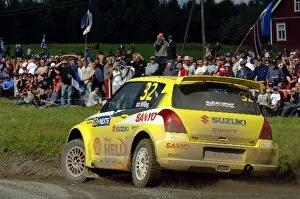 Images Dated 5th August 2005: FIA World Rally Championship: Guy Wilks, Suzuki Swift JWRC, on stage 7