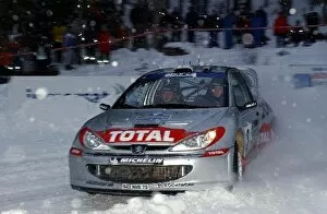 Images Dated 4th February 2002: FIA World Rally Championship: Harri Rovanpera Peugeot 206 WRC on stage 1