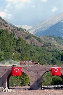 Turkey Collection: FIA World Rally Championship: Harri Rovanpera, Mitsubishi Lancer WRC, crosses a bridge on Stage 11