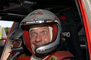 Images Dated 2nd June 2005: FIA World Rally Championship: Harri Rovanpera, Mitsubishi, pulls a face at the end of the final