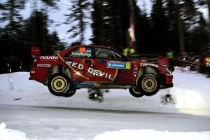 Images Dated 6th February 2006: FIA World Rally Championship: Kristian Sohlberg with co-driver Kaj Lindstrom Team Red Devil Atolye