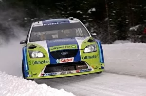 Images Dated 2nd February 2006: FIA World Rally Championship: Mikko Hirvonen with co-driver Jarmo Lehtinen BP Ford Focus RS WRC 06