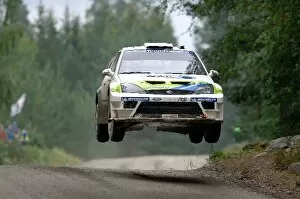 Finland Collection: FIA World Rally Championship: Mikko Hirvonen, Ford Focus RS WRC, on stage 4