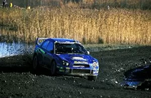 Images Dated 19th November 2002: Fia World Rally Championship: Petter Solberg and Phil Mills, Subaru Impreza WRC, enter Walters Arena