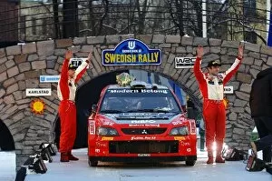 Images Dated 6th February 2006: FIA World Rally Championship: Third placed Daniel Carlsson with co-driver Bo Holmstrand Mitsubishi