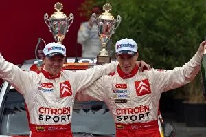 Images Dated 13th August 2006: FIA World Rally Championship: R-Kris Meeke and L-Glenn Patterson celebrate JWRC victory