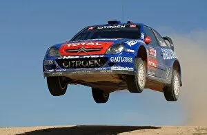 Water Collection: FIA World Rally Championship: Rally leader Sebastien Loeb, Citroen Xsara WRC