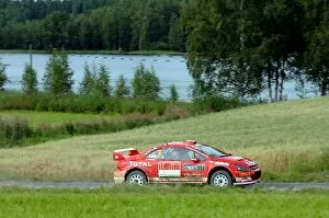 Finland Collection: FIA World Rally Championship: Rally leader Marcus Gronholm, Peugeot 307 WRC, on stage 16