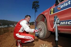 Images Dated 13th November 2005: FIA World Rally Championship: Rally winner Francois Duval Citroen Xsara WRC changes the wheels