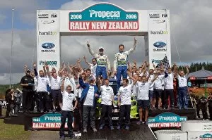 Team Picture Collection: FIA World Rally Championship: Rally winner Marcus Gronholm and the Ford team celebrate winning