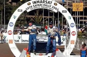 Images Dated 15th July 2002: FIA World Rally Championship: Rally winners Colin McRae, right