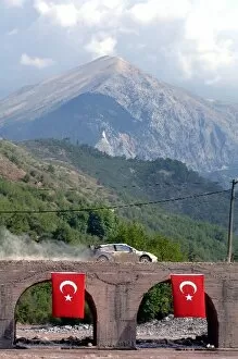 Turkey Collection: FIA World Rally Championship: Roman Kresta, Ford Focus RS WRC, crosses a bridge on Stage 11