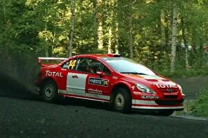 Images Dated 5th August 2004: FIA World Rally Championship: Sebastian Lindholm, Peugeot 307 WRC, on the shakedown stage