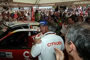 Team Principal Gallery: FIA World Rally Championship: Sebastien Loeb, Citroen, is congratulated by team principal Guy
