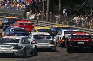 Nuremburg Gallery: The field of DTM cars squeeze through the first corner. DTM Championship