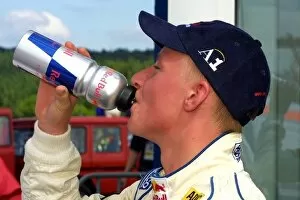 Images Dated 2nd June 2002: Formula BMW ADAC: Reinhard Kofler AUT) Red Bull Junior enjoys a Red Bull