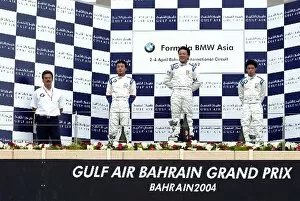 Images Dated 4th April 2004: Formula BMW Asia Championship: Race 2 podium: T. Sy 2nd, race winner Marchy Lee and K. You 3rd