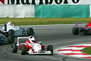 Images Dated 22nd March 2003: Formula BMW Asia: J. Veerapan spins at the first corner