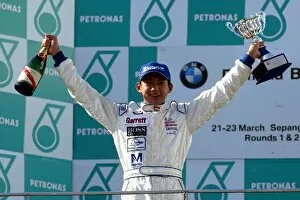 Images Dated 22nd March 2003: Formula BMW Asia: Race winner Ho-Pin Tung celebrates on the podium