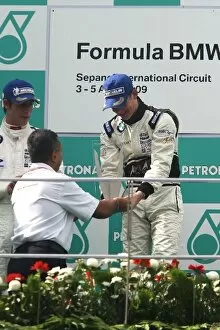 Images Dated 4th April 2009: Formula BMW Pacific: Race winner Gary Thompson Team E-Rain celebrates on the podium