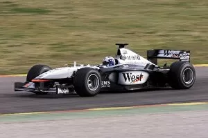 Images Dated 8th February 2001: Formula One Launch: David CoulthardMcLaren Mercedes MP4-16 puts the new MP4-16 through its paces