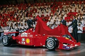 Images Dated 30th January 2001: Formula One Launch: Michael Schumacher, Rubens Barrichello and Luca Badoer unveil Ferraris 2001