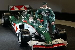 Team Mates Collection: Formula One Launch: R-L: Mark Webber and Christian Klien, in car, with the new Jaguar Cosworth R5